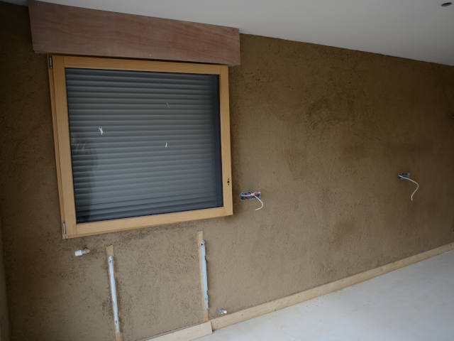 maison du pas sage enduits murs brique